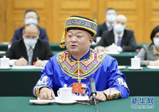  5月24日，全國人大代表宋慶禮參加湖北代表團的審議并發(fā)言。新華社記者 黃敬文 攝